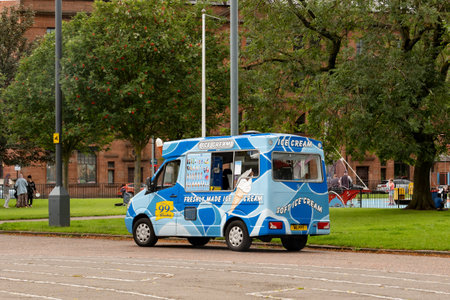 GLASGOW, SCOTLAND - JULY 31, 2019: The blue Mercedes-Benz Sprinter van of the Mr Whippy Scotland company selling delicious ice cream at the Glasgow Green Parkのeditorial素材