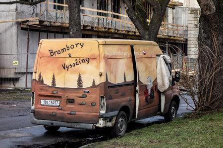 OSTRAVA, CZECHIA - FEBRUARY 28, 2019: A robbed Ford Transit van left on a street with wrenched doors as a sign of vandalismのeditorial素材