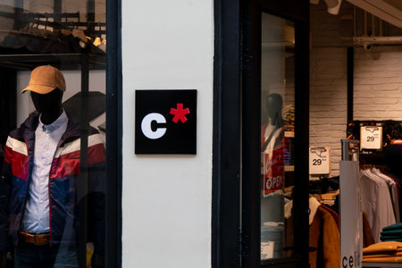 VALLETTA, MALTA - OCTOBER 29, 2019: The square logo of the Celio luxury clothing fashion store with open door to interiorのeditorial素材