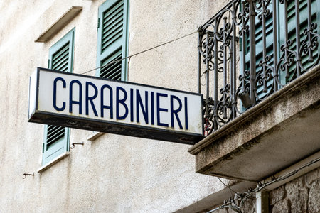 The sign of Carabinieri, Italian police, at a historical Sicilian cityの写真素材