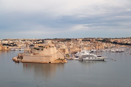 VALLETTA, MALTA - OCTOBER 29, 2019: Landscape of Valletta city and its harbour with luxury yachts in Malta viewed from Upper Barrakka Gardens fortのeditorial素材