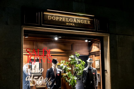 PALERMO, SICILY - FEBRUARY 8, 2020: The storefront of the Doppelganger boutique which sells luxury menswear. Thw word saldi represents discount in Italianのeditorial素材