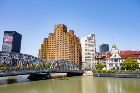 SHANGHAI, CHINA - APRIL 13, 2017: Buildings of Broadway Mansions Hotel, Jahwa Building, Consulate General of the Russian Federation and Waibaidu Bridge in Shanghai, Chinaのeditorial素材