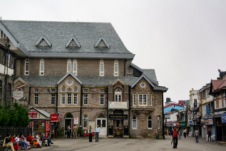 SHIMLA, HIMACHAL PRADESH, INDIA - JULY 23, 2013: Gaiety Heritage Cultural Complex Shimla and Police Assistance Room with people walking around in Indiaのeditorial素材