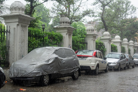 AMRITSAR, PUNJAB, INDIA - JULY 20: Sudden monsoon rainstorm on the street in Amritsar, Punjab, India...