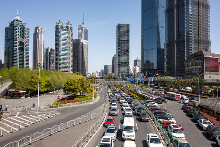 SHANGHAI, CHINA - APRIL 13, 2017: Lujiazui E Road in Shanghai, China. The main street in bund full of cars below the famous skyscrapers in business centreのeditorial素材