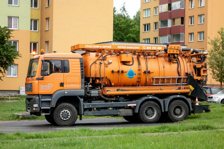 HAVIROV, CZECHIA - JUNE 5, 2020: The orange MAN TGA 26.430 truck with water pump as an emergency vehicle of SmVaK companyのeditorial素材