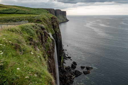Mealt Falls at Isle of Skye in Scotland, Great Britain in cloudy weatherの写真素材