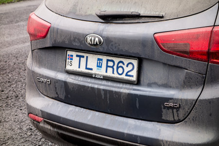 DJUPIVOGUR, ICELAND - JULY 2, 2014: Very dirty and wet rear part of Kia Ceed station wagon car during the road trip around Iceland.のeditorial素材