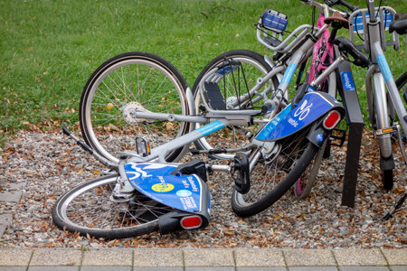 OSTRAVA, CZECH REPUBLIC - OCTOBER 3, 2020: Vandalism. Nextbike bike-sharing bicycles thrown on the ground instead of being put into the standのeditorial素材