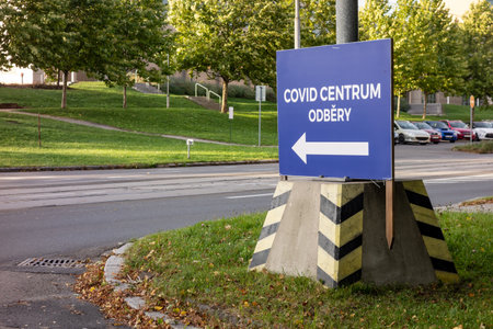 Sign with an arrow showing the place for COVID-19 testing center (Odbery or Odberove Misto in Czech) in Ostravaのeditorial素材