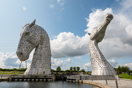 FALKIRK, SCOTLAND - AUGUST 13, 2019: Enormous statue of The Kelpies, horses heads in Falkirk, Scotland created by Andy Scottのeditorial素材