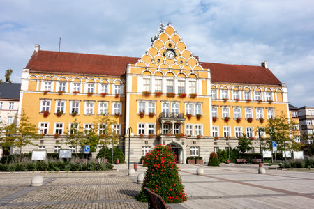 CESKY TESIN, CZECH REPUBLIC - OCTOBER 7, 2018: The city hall building in the center of Cesky Tesin city at CSA town square with bush in front of itのeditorial素材