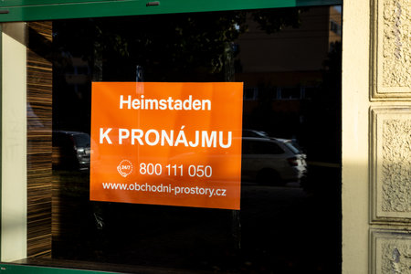 OSTRAVA, CZECH REPUBLIC - OCTOBER 3, 2020: The commercial poster of Heimstaden company on a window offering the rental of office in Czechのeditorial素材
