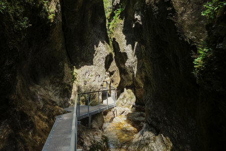 The metal bridges in Janosikove diery trail between rocks in Terchova, Slovakia, EUの写真素材