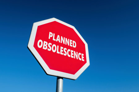 Stop sign with PLANNED OBSOLESCENCE text against the strategy when product break down by themselves after warranty periodの写真素材