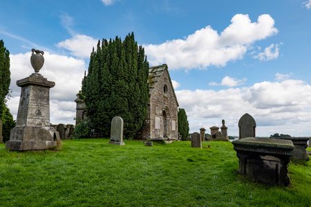 KINROSS, SCOTLAND - AUGUST 12, 2019: Small chappel near Kinross town and Loch Leven with a graveyard...