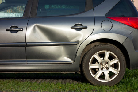 OSTRAVA, CZECH REPUBLIC - MAY 4, 2021: The side door of Peugeot 208 SW vehicle which was damaged in a traffic accidentのeditorial素材
