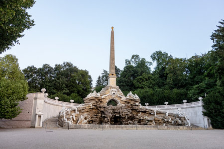 AUSTRIA, VIENNA - JULY 27, 2021: Obeliskbrunnen water fountain with Sybillengrotte cave in Schonbrunn park, Vienna, Austriaのeditorial素材