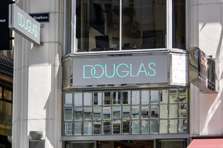 VIENNA, AUSTRIA - JULY 27, 2021: The banner of Douglas company which sells luxury perfumes od a building with windows in Vienna, Austriaのeditorial素材