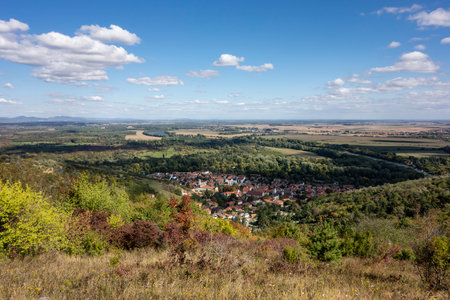 Hungarian landscape and hills with houses in Tokaj village, farmland and fieldsの写真素材