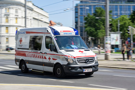 VIENNA, AUSTRIA - JULY 28, 2021: Mercedes-Benz Sprinter ambulance car in Vienna, Austria with strong motion blur effectのeditorial素材