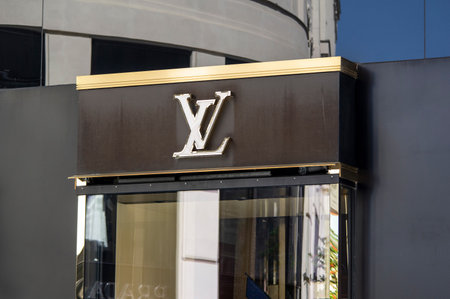 VIENNA, AUSTRIA - JULY 27, 2021: The banner of Louis Vuitton with the logo of the comapy above its...