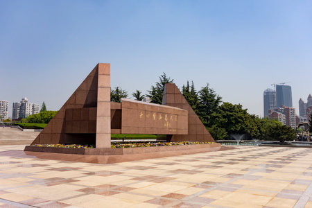 SHANGHAI, CHINA - APRIL 15, 2017: The red marble memorial  in Longhua Gardens Park in center of Shanghai, Chinaのeditorial素材