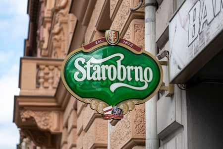 BRNO, CZECH REPUBLIC - SEPTEMBER 17, 2019: The green banner of the Czech Starobrno brewery above the entrance to a pubのeditorial素材