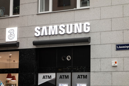 VIENNA, CZECH REPUBLIC - JULY 28, 2021: The logo of Korean Samsung company at storefront of the retail seller of smartphones and other devicesのeditorial素材