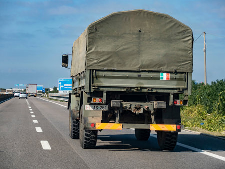 BRINDISI, ITALY - OCTOBER 28, 2021: Italian army vehicle on a highway driving for a dutyのeditorial素材
