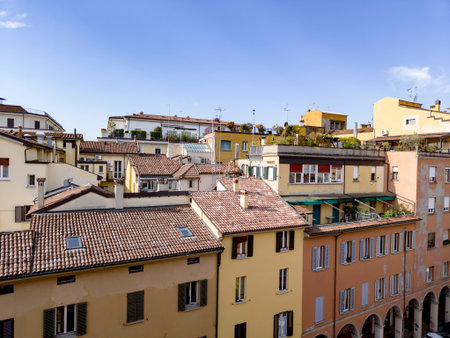 Roofs of old houses in Bologna city in Italy with balconies and nice terraces