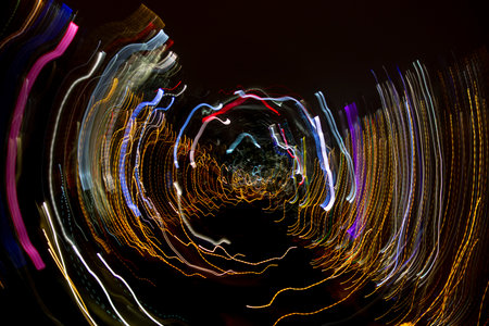 Circular colourful irregular light trails of the night cityの写真素材