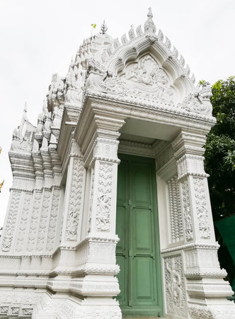 the entrance door of Thai temple with Thai pattern detail styleの写真素材