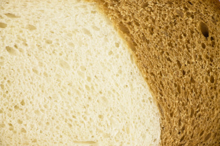 Closeup of white and brown loaf.