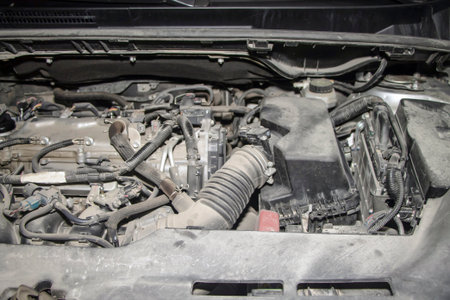 The engine of the modern car in the dust.の写真素材