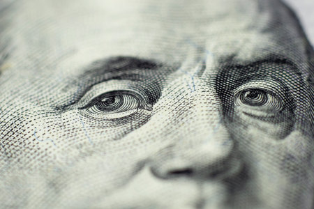 Benjamin Franklin's look on a hundred dollar bill. Benjamin Franklin portrait macro usa dollar banknote or bill. Selective focus.の写真素材