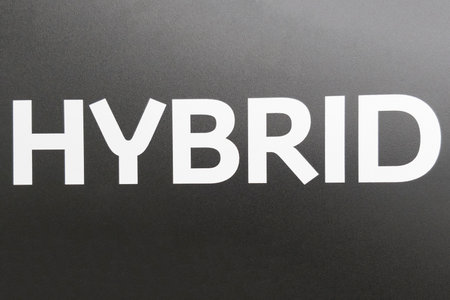 HYBRID inscription on a gray background.の写真素材