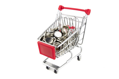 The batteries for the watch are in the supermarket basket. Isolated.の写真素材