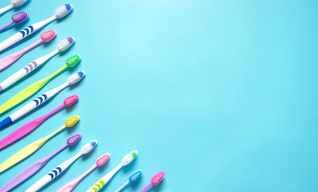 Top view of toothbrushes in colorful on pastel color background.の写真素材