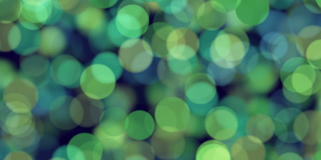 Blurred bokeh light Christmas background. 
New Year holidays template. 
Abstract glitter defocused blinking stars and sparks.の写真素材