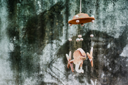 Concrete Wall with Sea horse mobileの写真素材