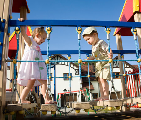 Little children on playgroundの写真素材