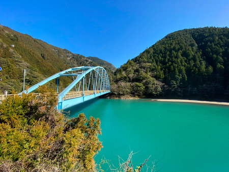 A bridge over a Japanese lake.の写真素材