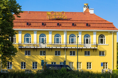 The yellow facade of one of Swedens few casinos: Casino Cosmopol, placed in Slottsparken, MalmÃ¶, Sweden.のeditorial素材
