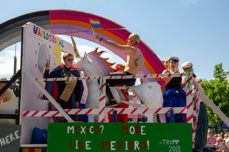 A float with political messages related to Donald Trump, Vladimir Putin and Kim Jong-un in the parade Lundakarnevalen, where university students mocks recent events.のeditorial素材