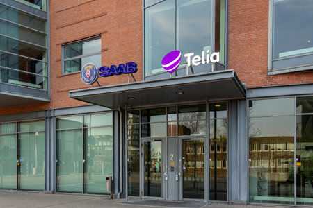 MalmÃ¶, SkÃ¥ne, Sweden - 04 06 2019: The entrance to an office building in VÃ¤stra hamnen, MalmÃ¶, where Saab and Telia has their offices.のeditorial素材