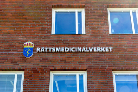 Lund, Sweden - May 11 2019: The sign of RÃ¤ttsmedicinalverket (Department for Forensic Medicine) mounted on their building at the hospital area of Lund hospital, SkÃ¥ne, Sweden.のeditorial素材