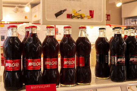 Stockholm, Sweden - July 15 2019: A number of drink bottles containing Molecola, an Italian brand of Cola, that was on display at an Eataly store in Stockholm, Sweden.のeditorial素材