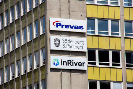 MalmÃ¶, Sweden - June 20 2019: Three company signs (Prevas, SÃ¶derberg & Partners, inRiver) mounted on a building in the area of SÃ¶dertull, MalmÃ¶, Sweden.のeditorial素材